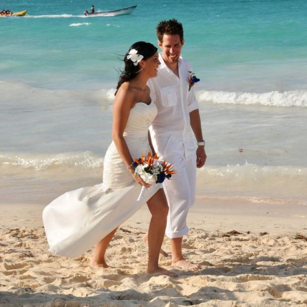 Bride-and-groom-walking-Punta-Cana